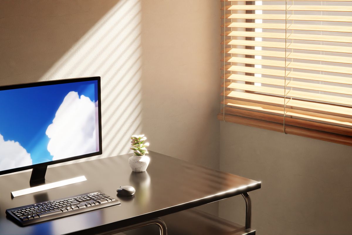 Espacio de trabajo con monitor y brillo en nits